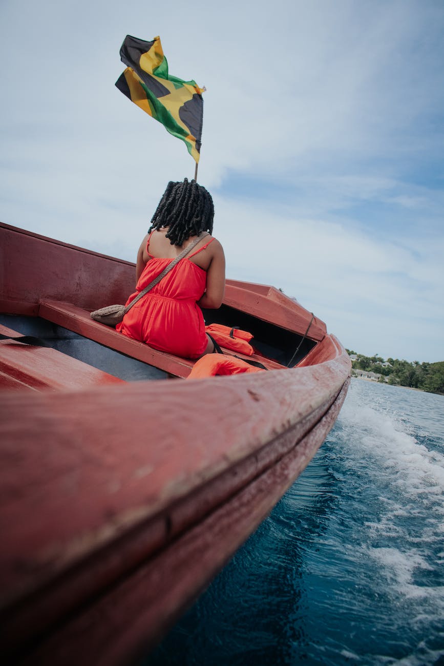 woman riding on a wooden boat