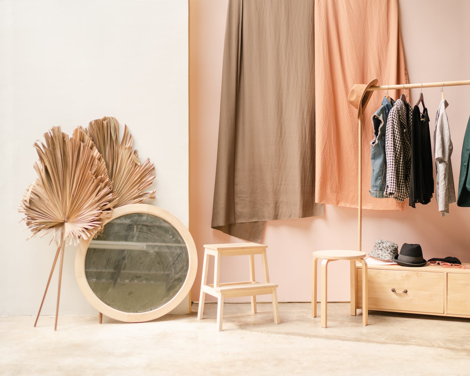 clothes and mirror inside a room